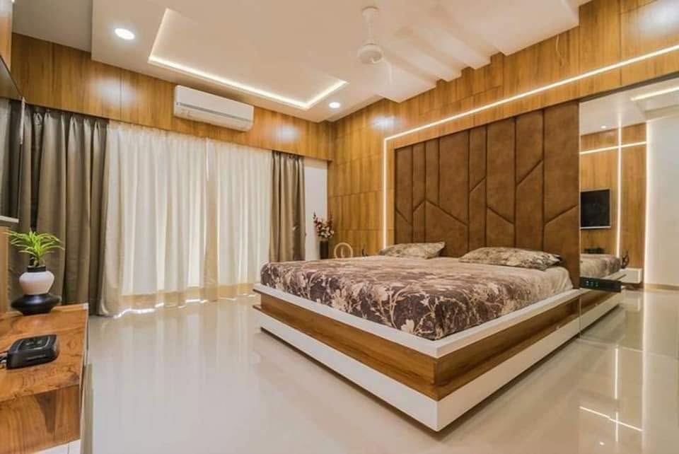 Modern Bedroom with Wooden Accents and Ambient Lighting