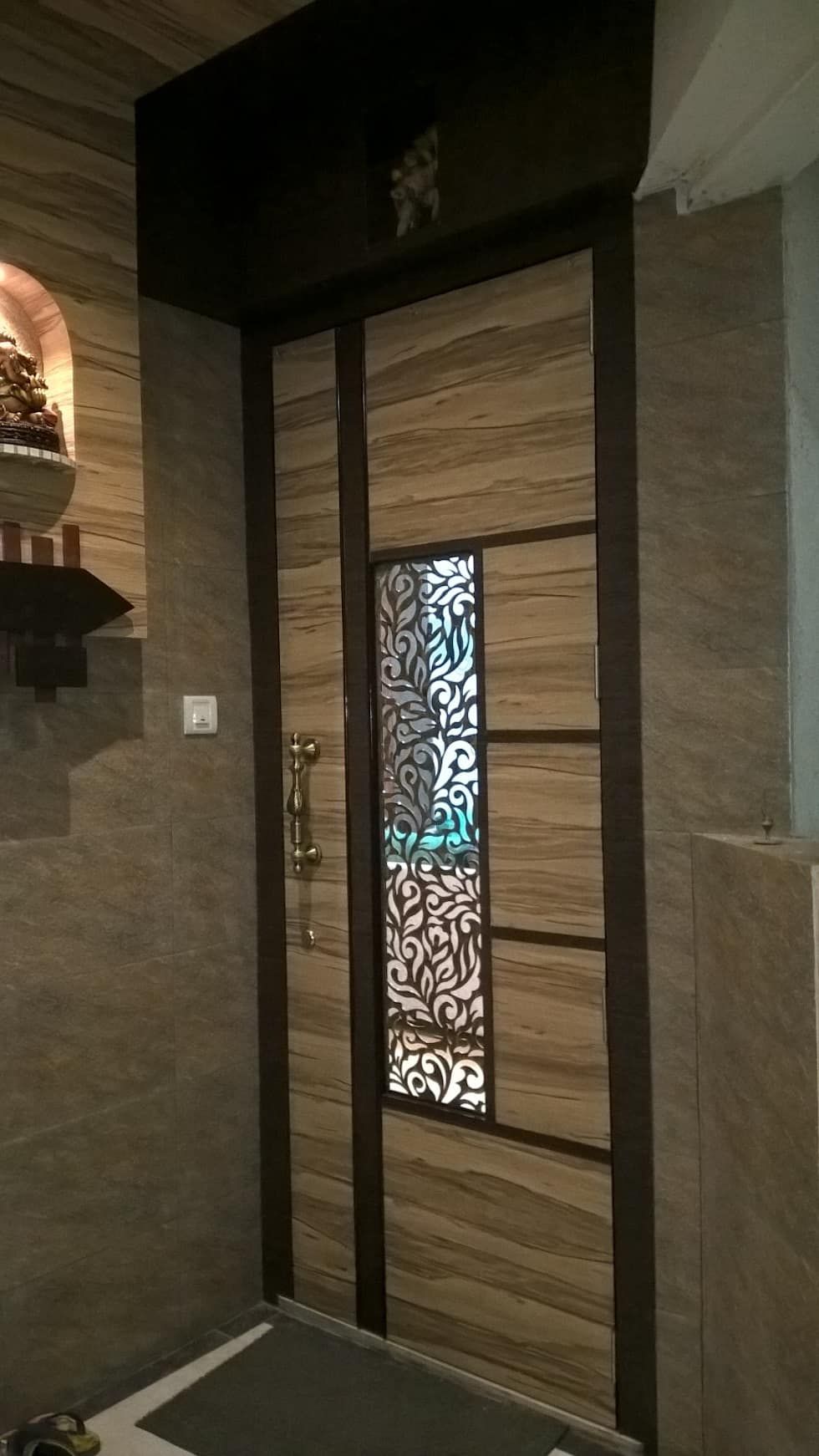 Modern Wooden Entry Door with Ornate Metal Grill Panel
