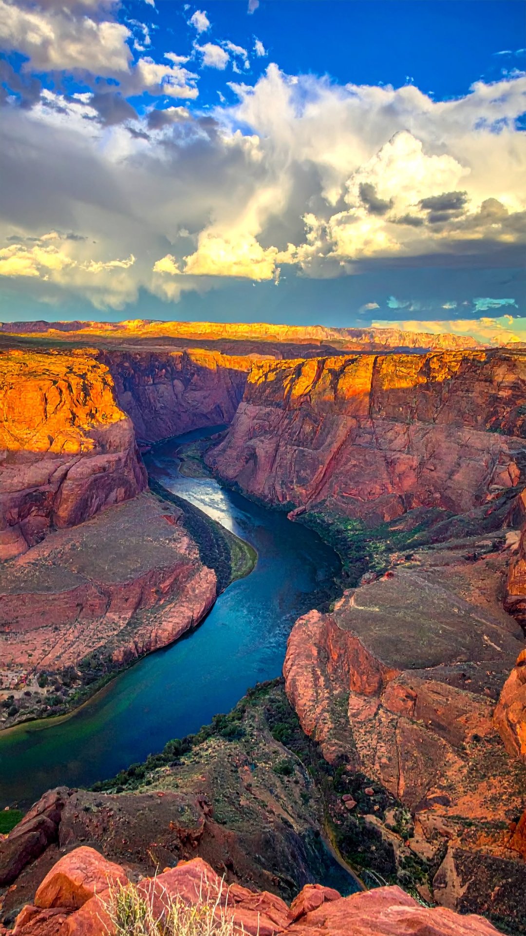 Dramatic River Bend Through Red Rock Canyon at Sunset