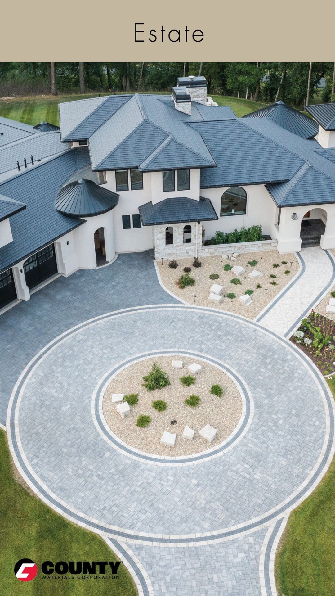 Circular Paver Driveway with Modern Estate Home and Landscaped Center Island